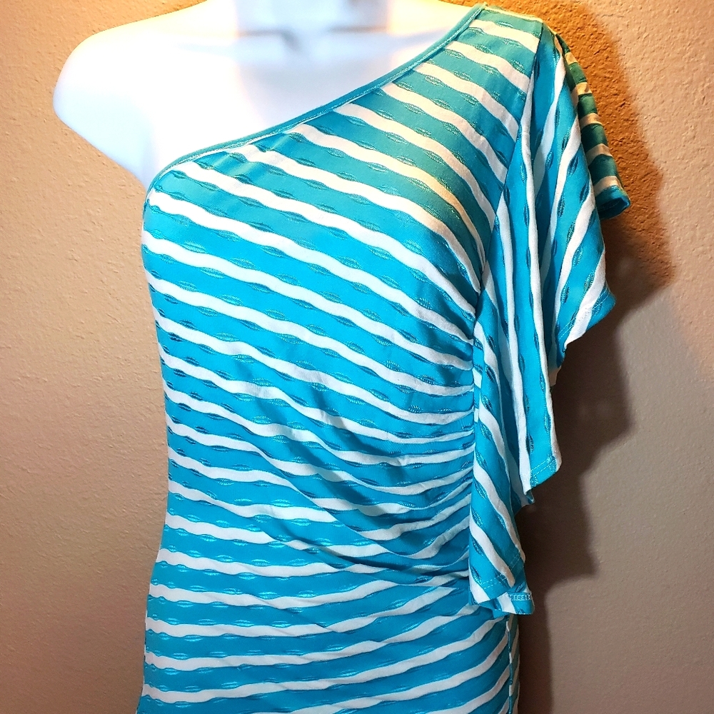 Green apple blue top